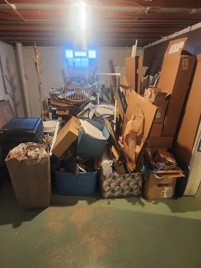 Roll-off dumpster container at job site for Yard Waste Dumpster Rental in Stanley